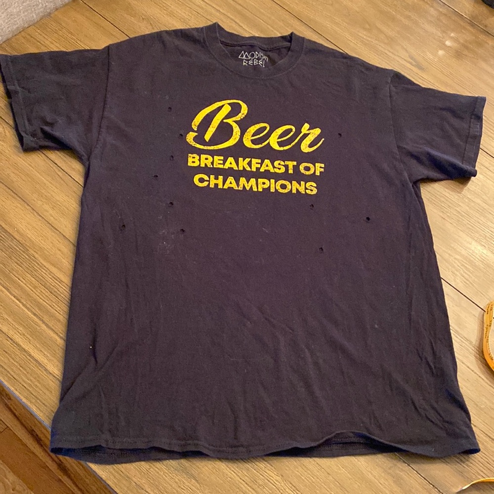 Buckle bought 100% cotton t shirt, very comfortable.